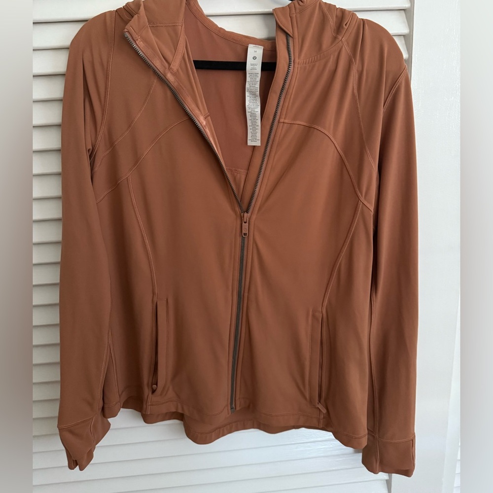 Lululemon Define Full Zip Hoodie
size: 14
Color: rust